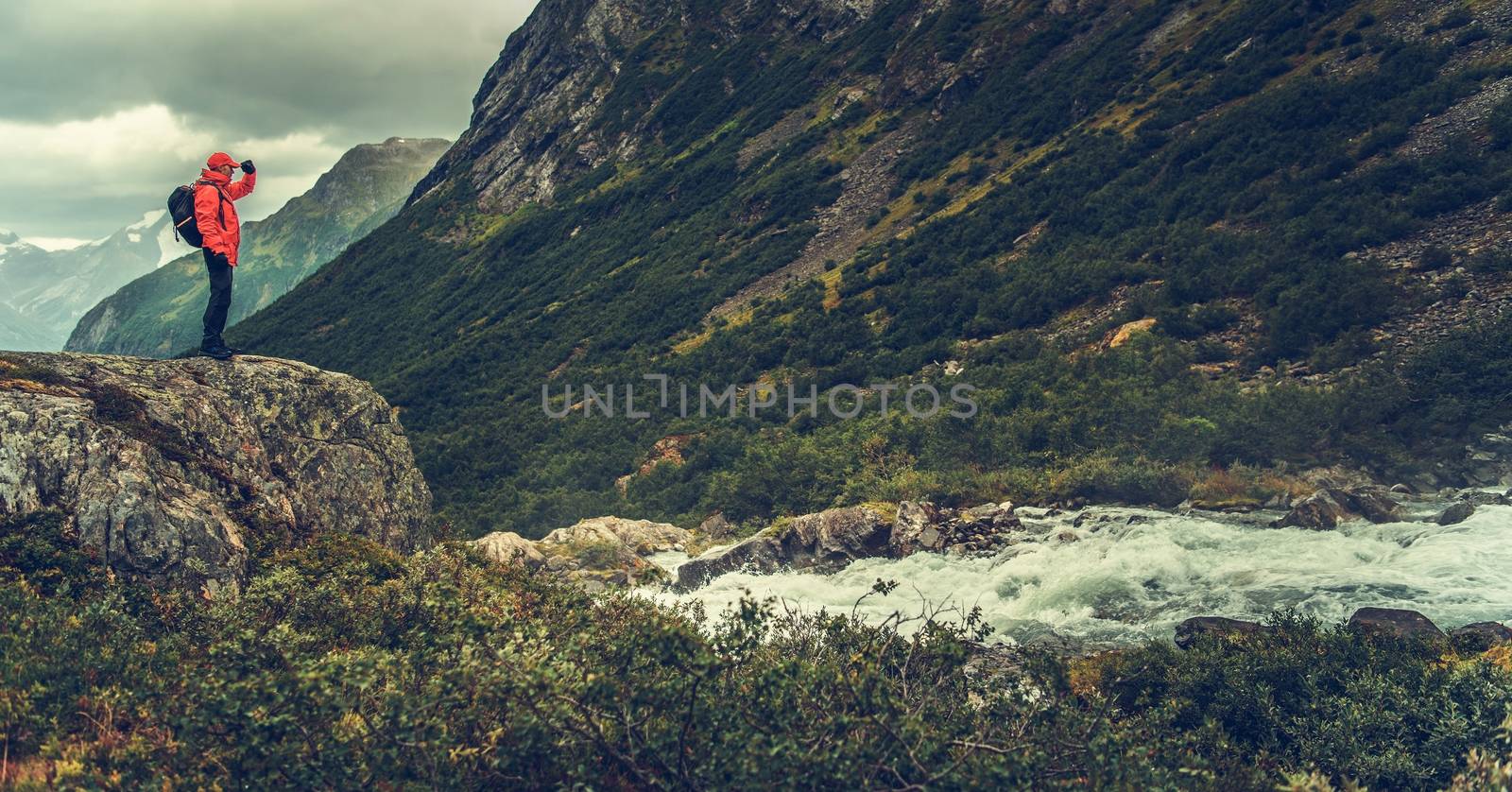 Caucasian Traveler in His 30s Exploring Scandinavia. Outdoor and Adventure Theme.