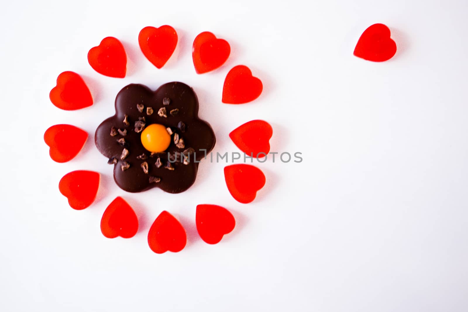 confectionery - marmalade in the form of a heart and cookies in the form of a flower by alexandr_sorokin
