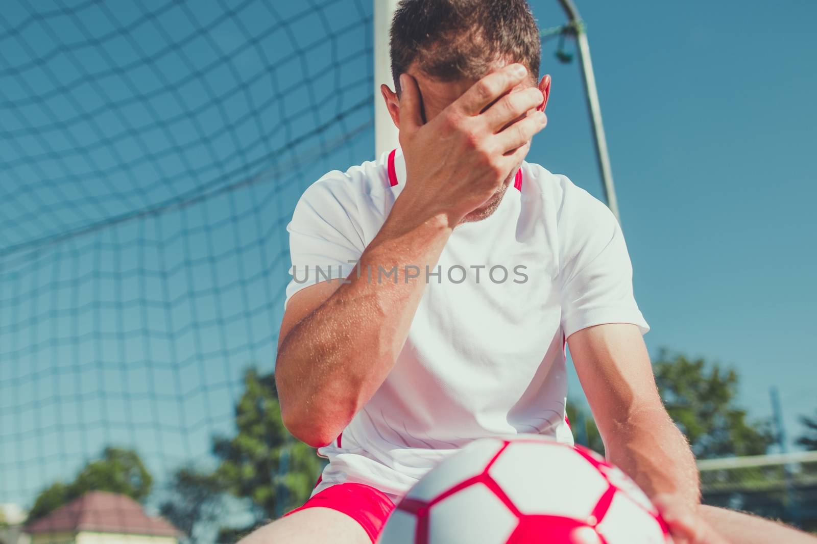 Soccer Fan Frustration. Devastated Caucasian Euro Football Fan in His 30s on the Soccer Field.