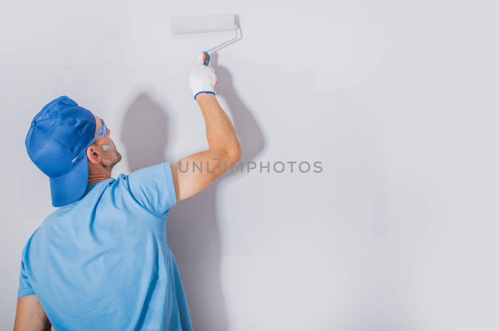 Men Painting His Apartment by welcomia