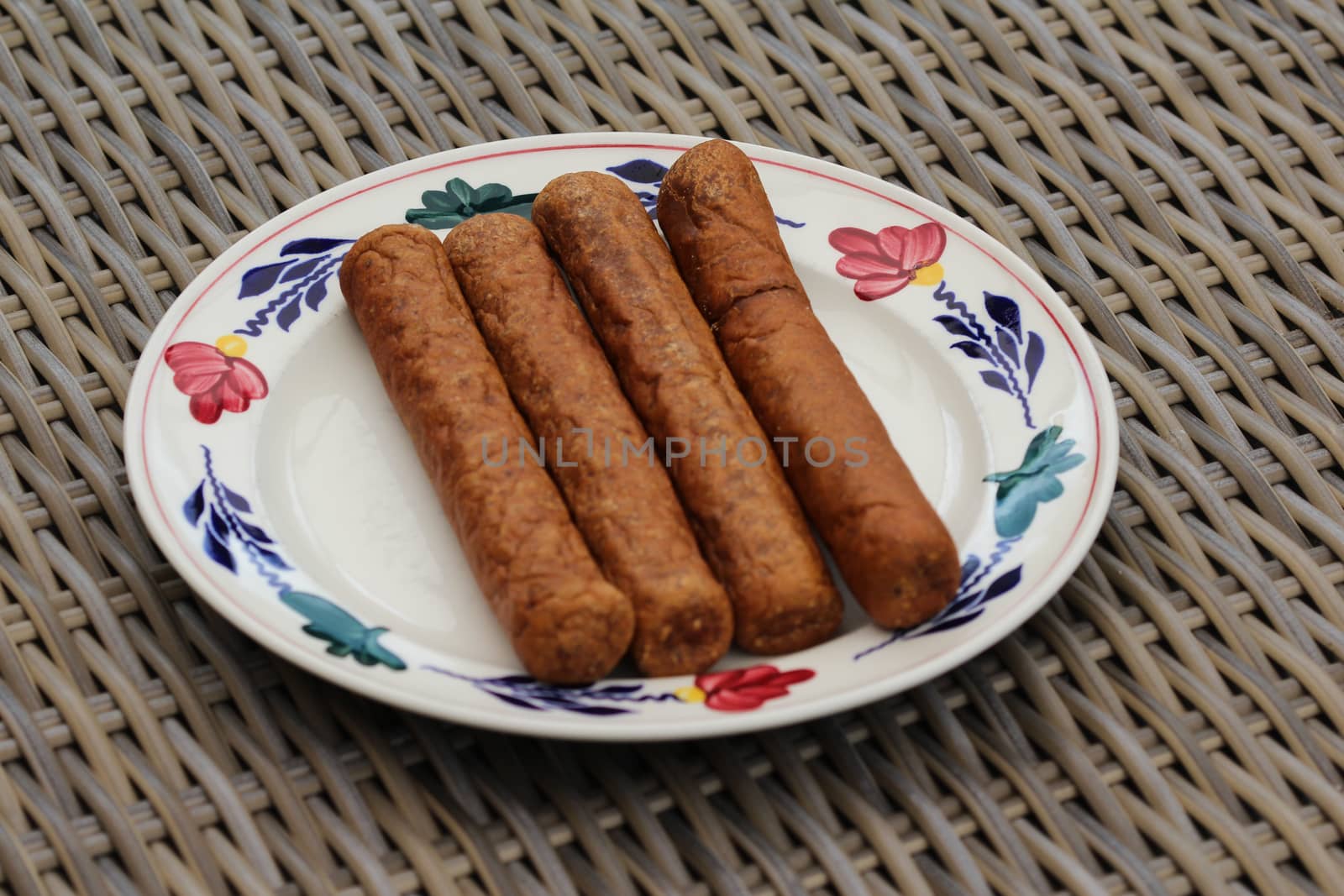 close up of frikandel, a traditional Dutch snack, a sort of minced meat hot dog