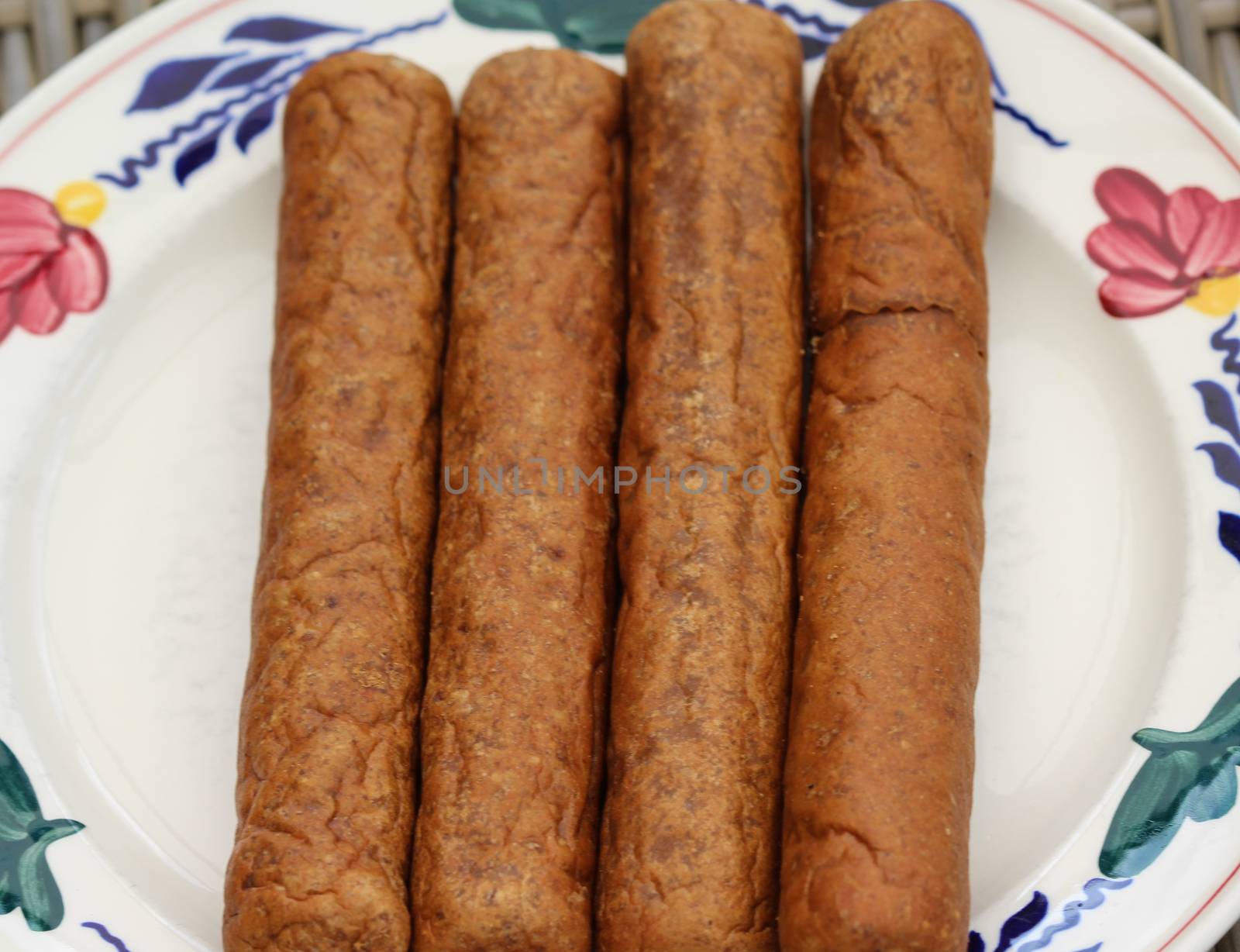 close up of frikandel, a traditional Dutch snack, a sort of minced meat hot dog