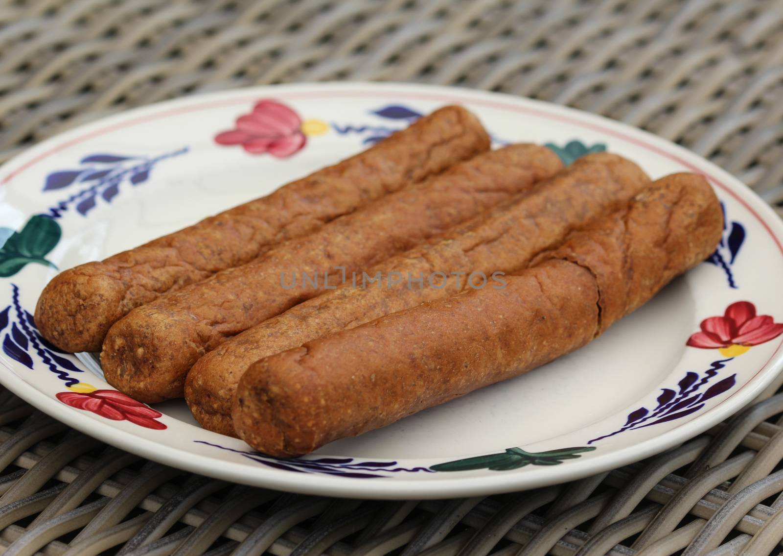 close up of frikandel, a traditional Dutch snack, a sort of minced meat hot dog