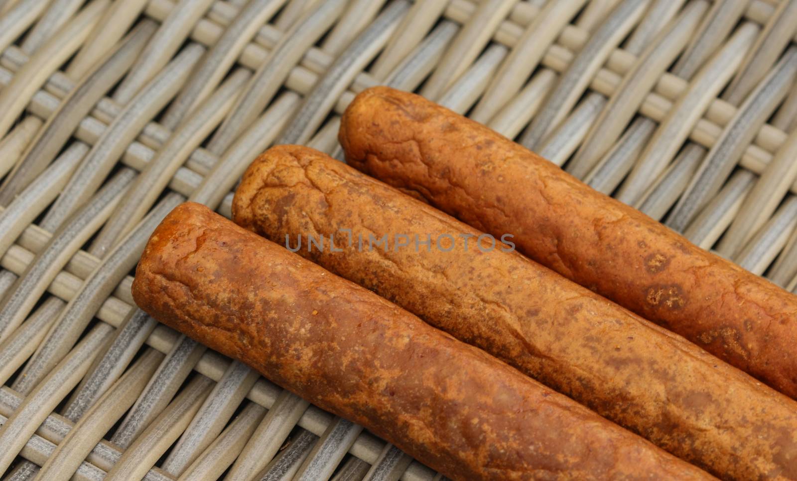 close up of frikandel, a traditional Dutch snack, a sort of minced meat hot dog