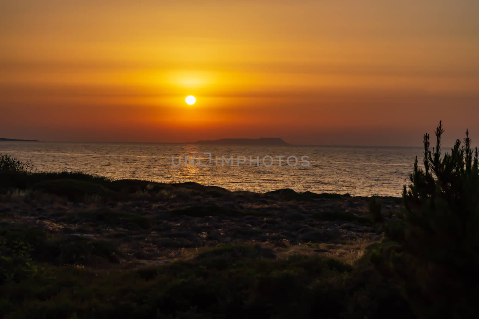 Sissi harbour, Crete, at sunset. A sunset view of Sissi habour. Sissi is a small town in NE Crete, one of the Greek Islands