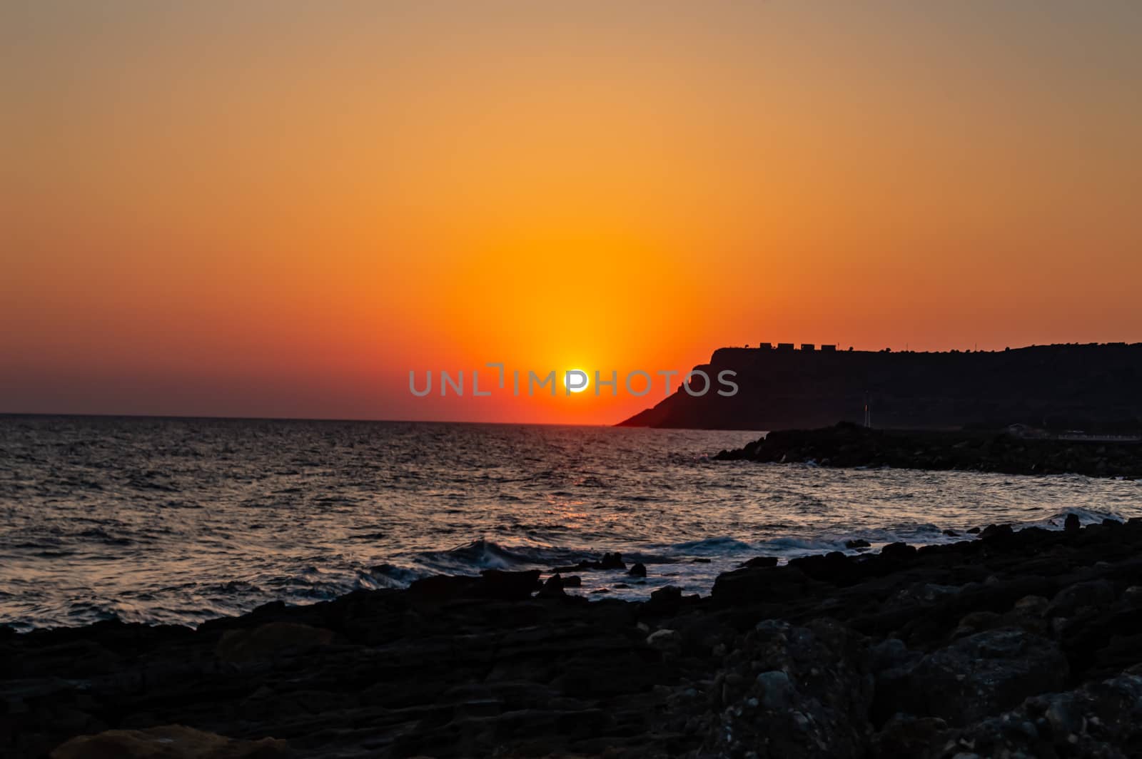 Sunrise at Sissi, Crete. Sunrise over the sea at Sissi  by Philou1000