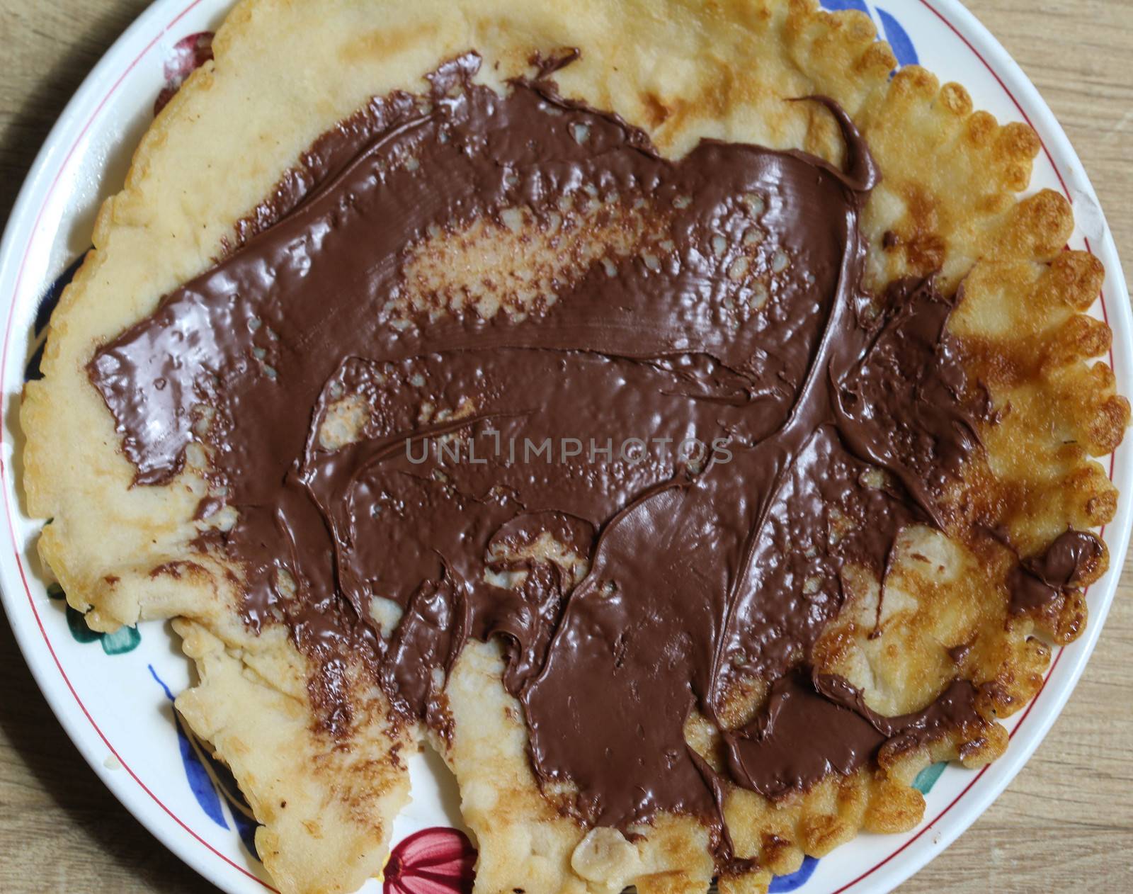 close up of pancake with chocolate pasta
