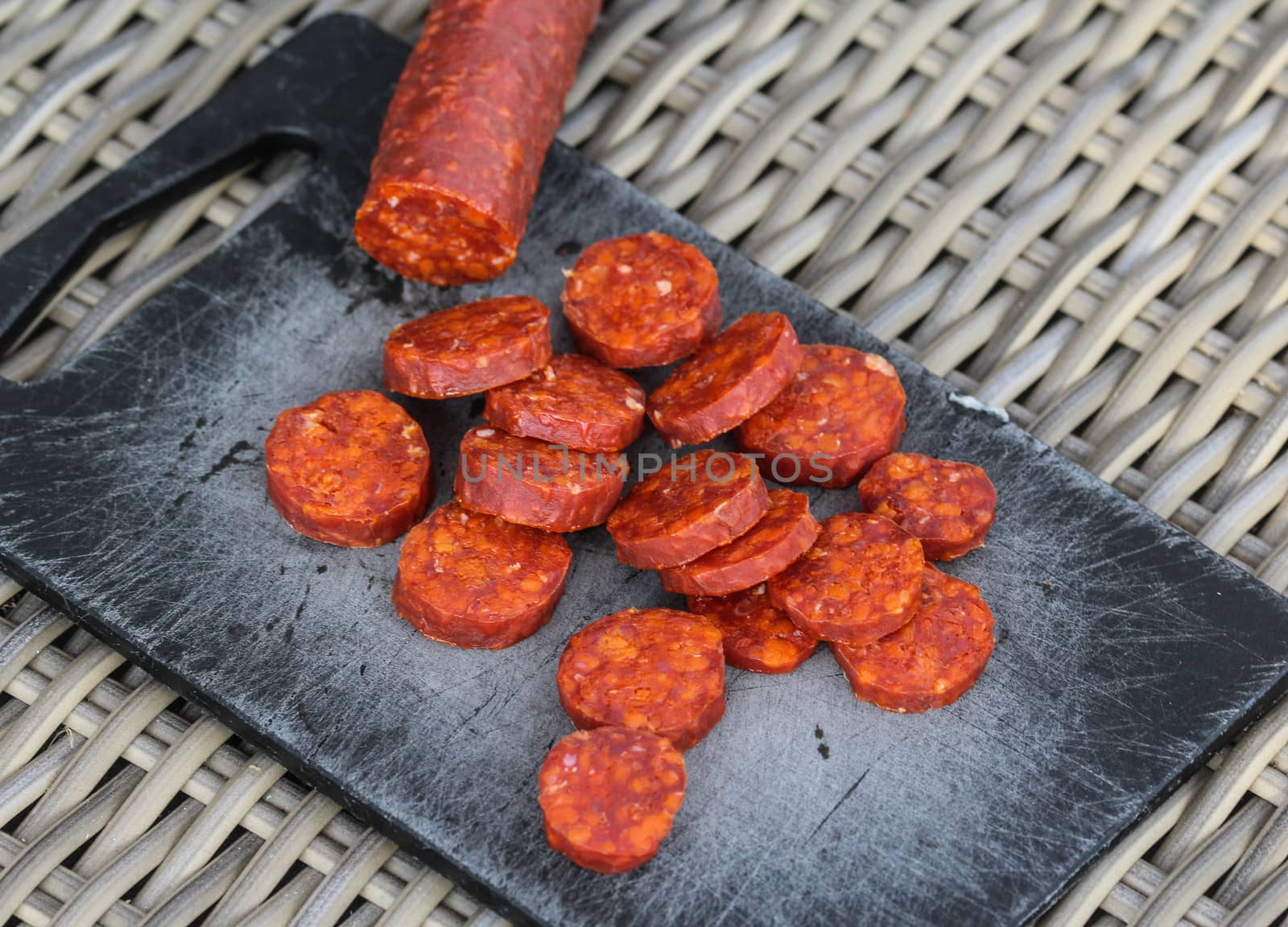 Close up of chorizo sausages on board