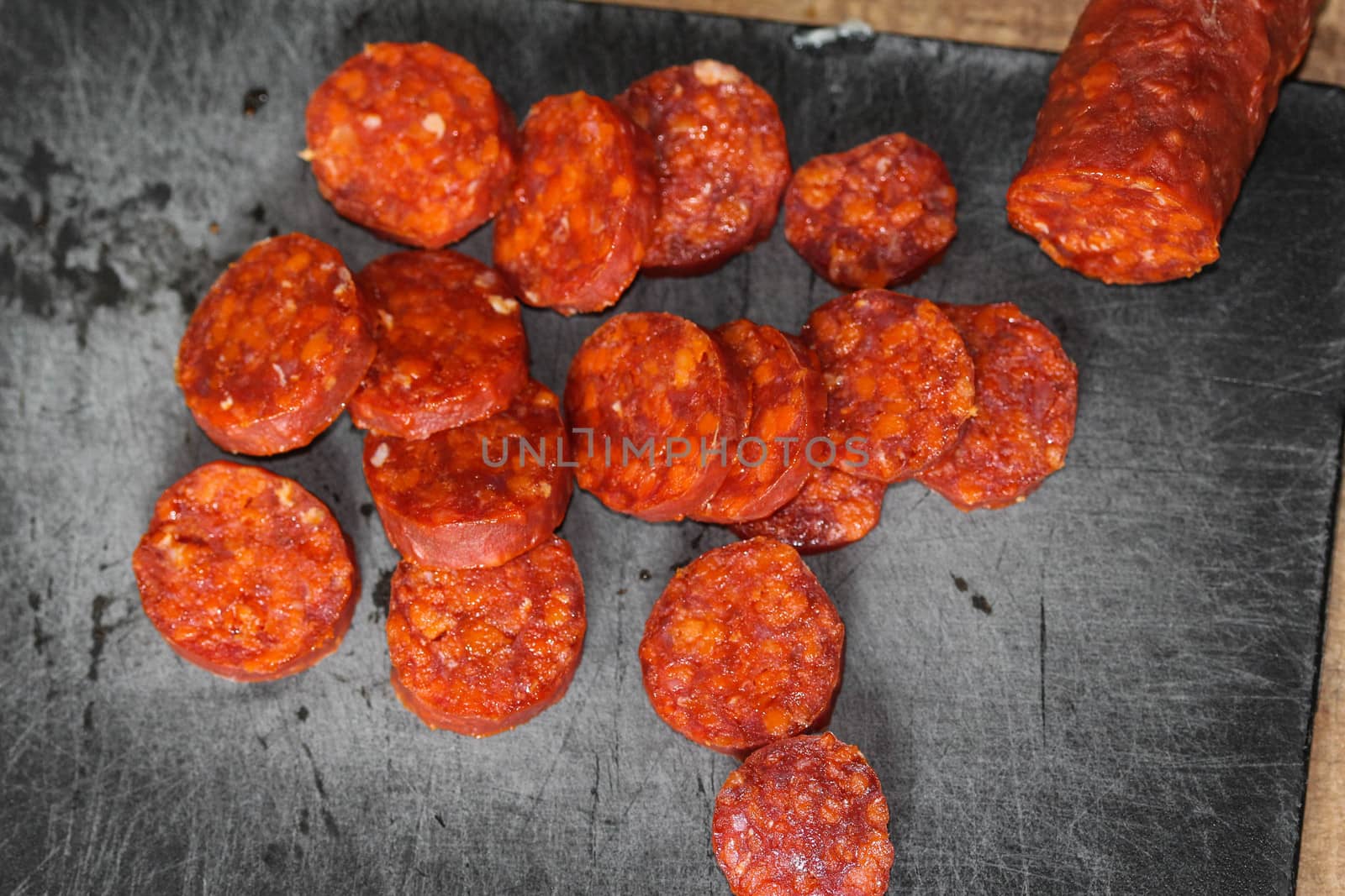 Close up of chorizo sausages on board