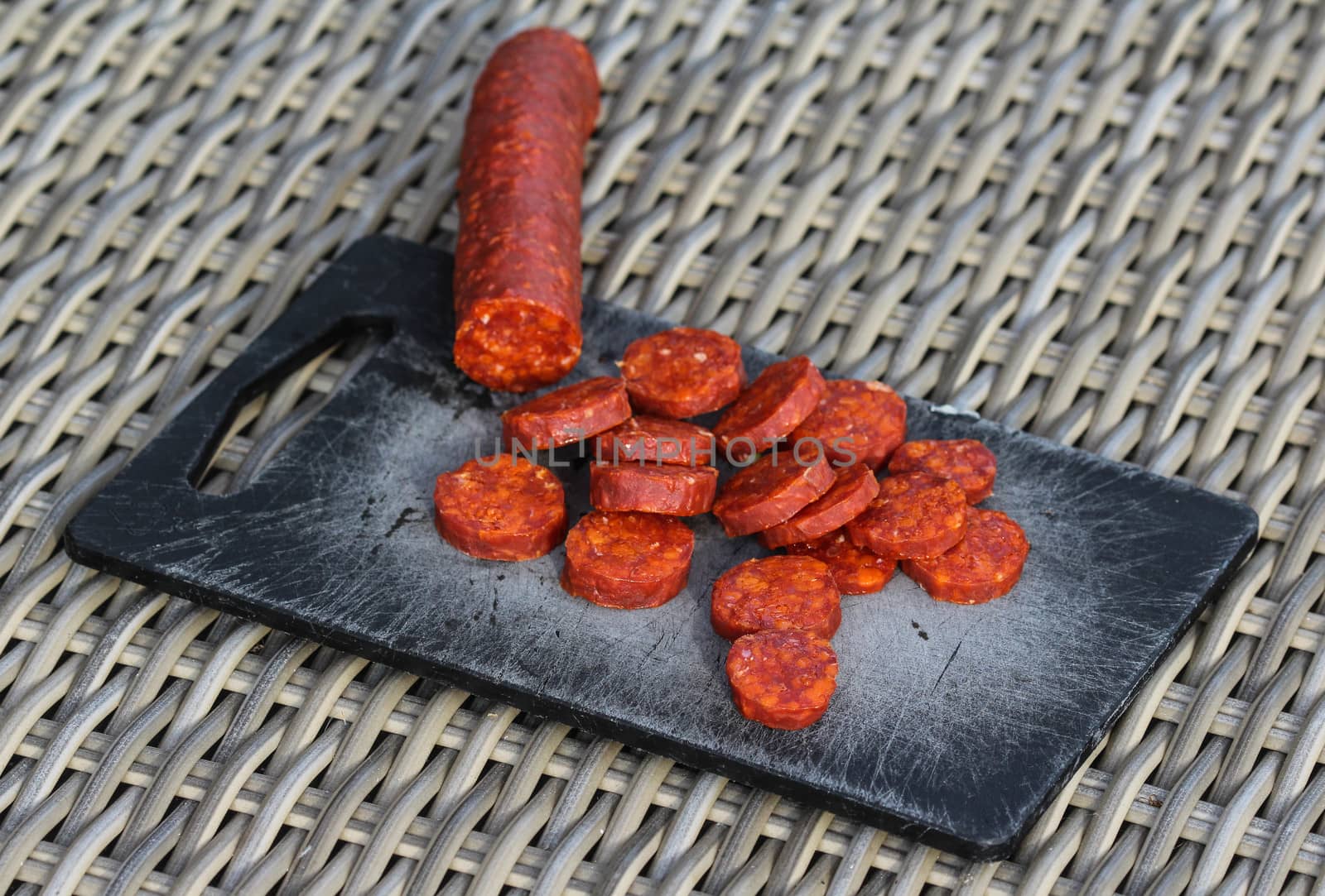 Close up of chorizo sausages on board