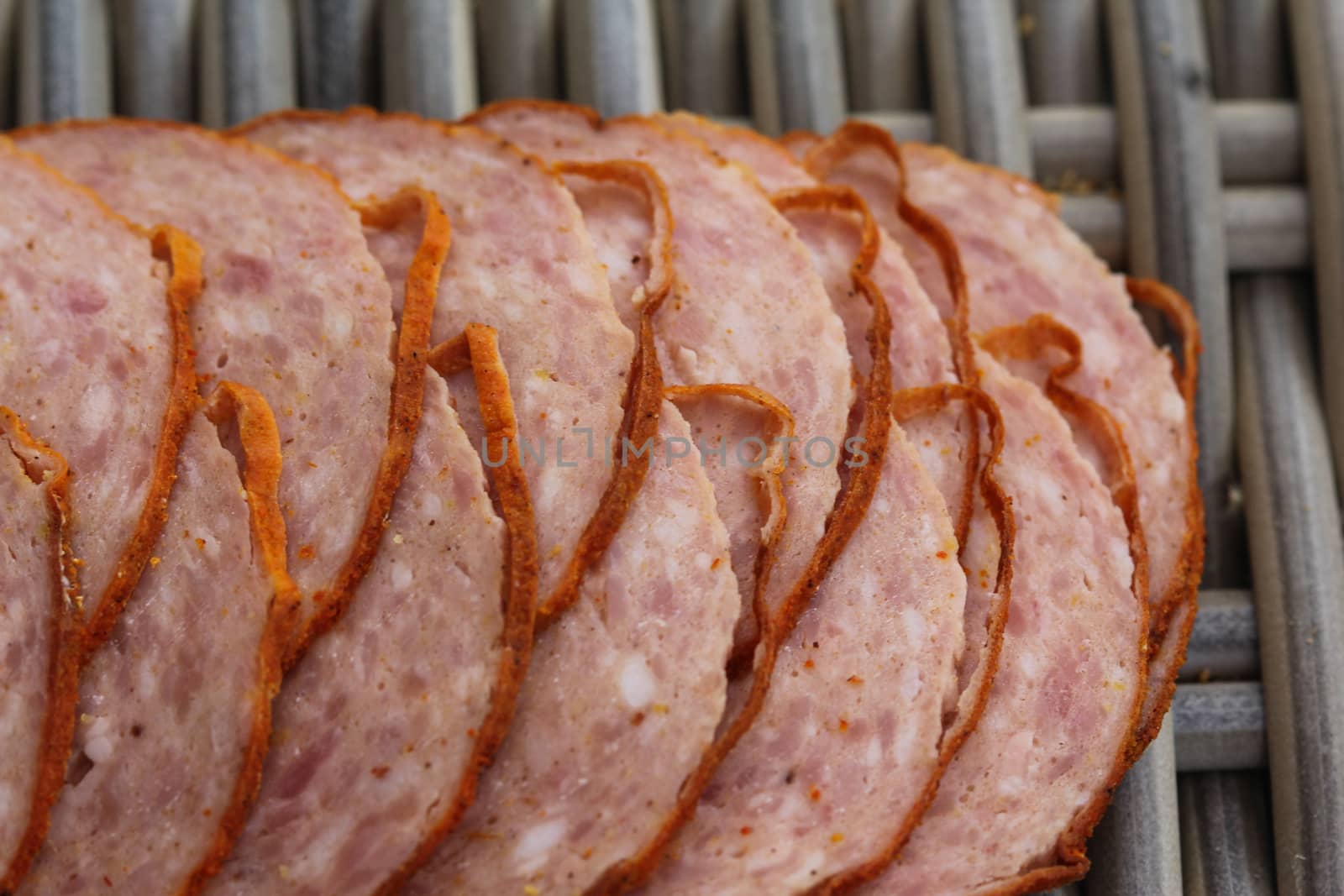 close up of Dutch grilled sausage "grillworst" on wooden table background