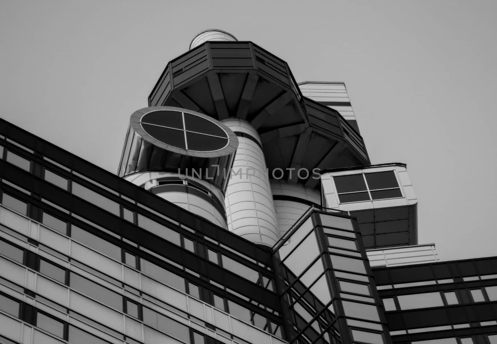 Looking up at black and white architecture
