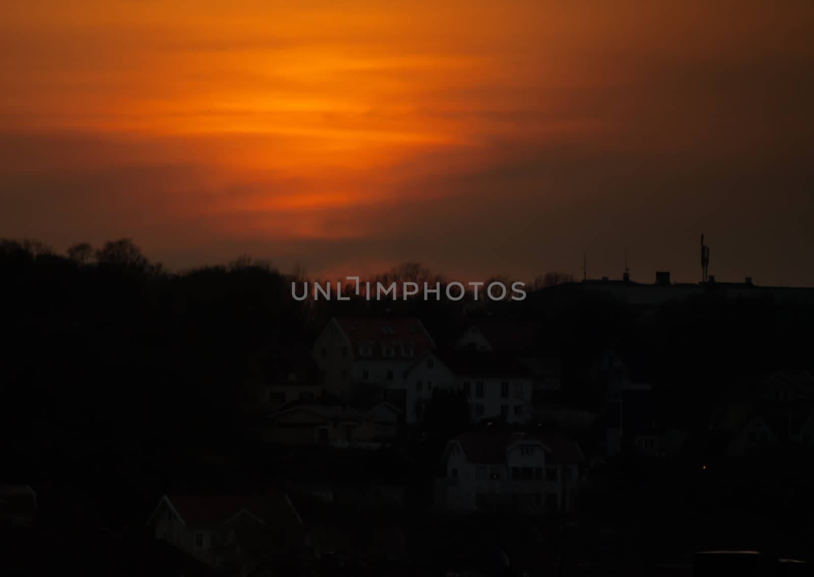 Orange vibrant sunset with some clouds