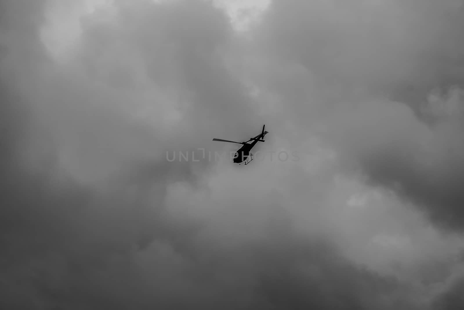 A single helicopter in the sky by arvidnorberg