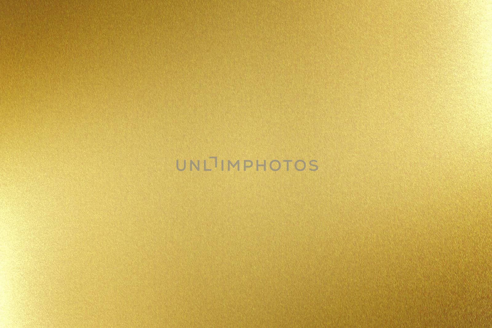 Light shining on gold metal board, abstract texture background