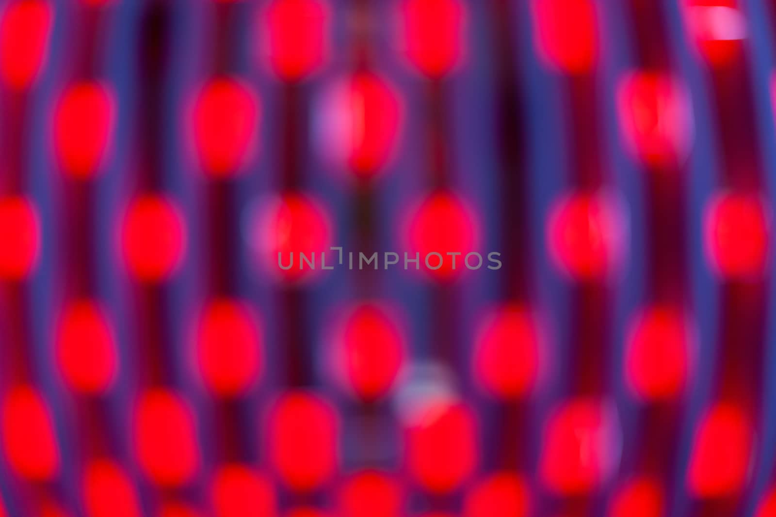 Abstract blurred background with numerous colourful bright festive bokeh. Texture with copy space for text. Celebration, holidays concept. Horizontal