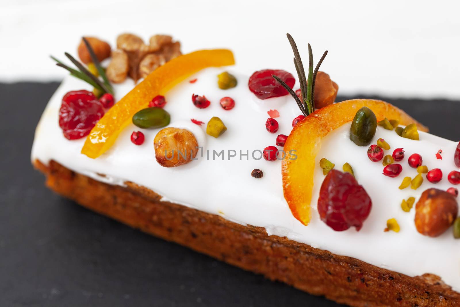 Creative Easter cake with nuts, dried fruits, candied fruit and spices. Happy Easter concept. Close-up. Macro. Selective focus