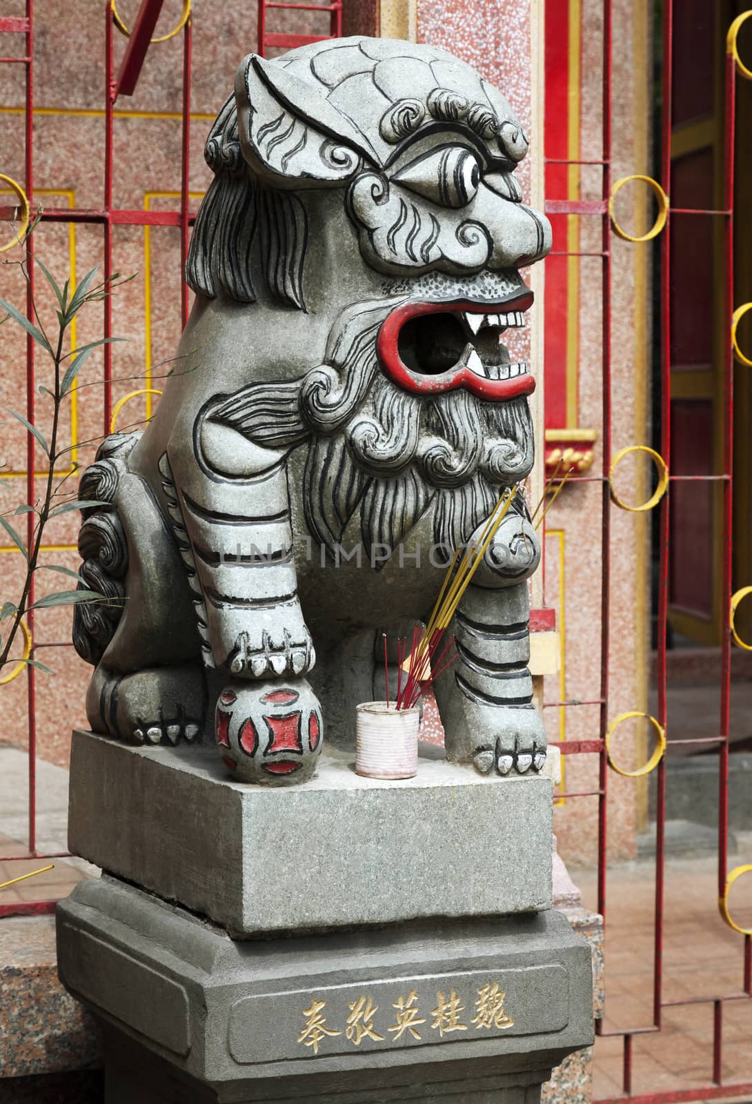 Marble lion at the entrance of a temple, Vietnam