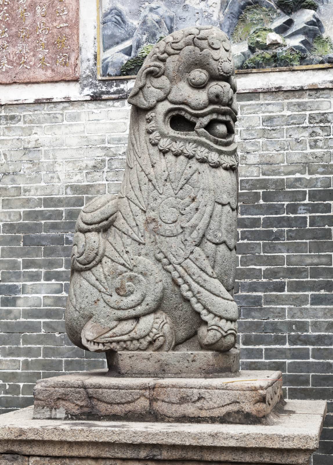 Marble lion at the entrance of a temple, Vietnam