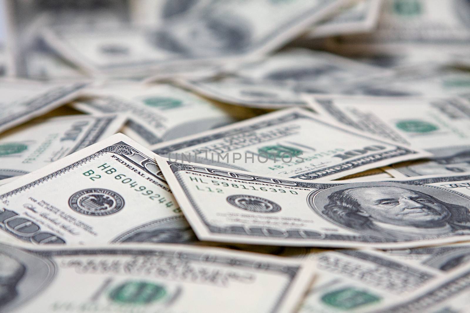 Cash. Banknotes on hundred dollars, close up. by fogen