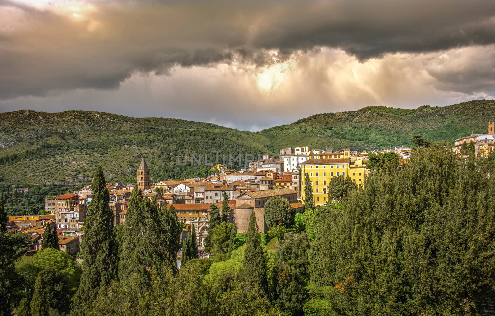 italian town of Tivoli near Rome with dramatic stormy sky .