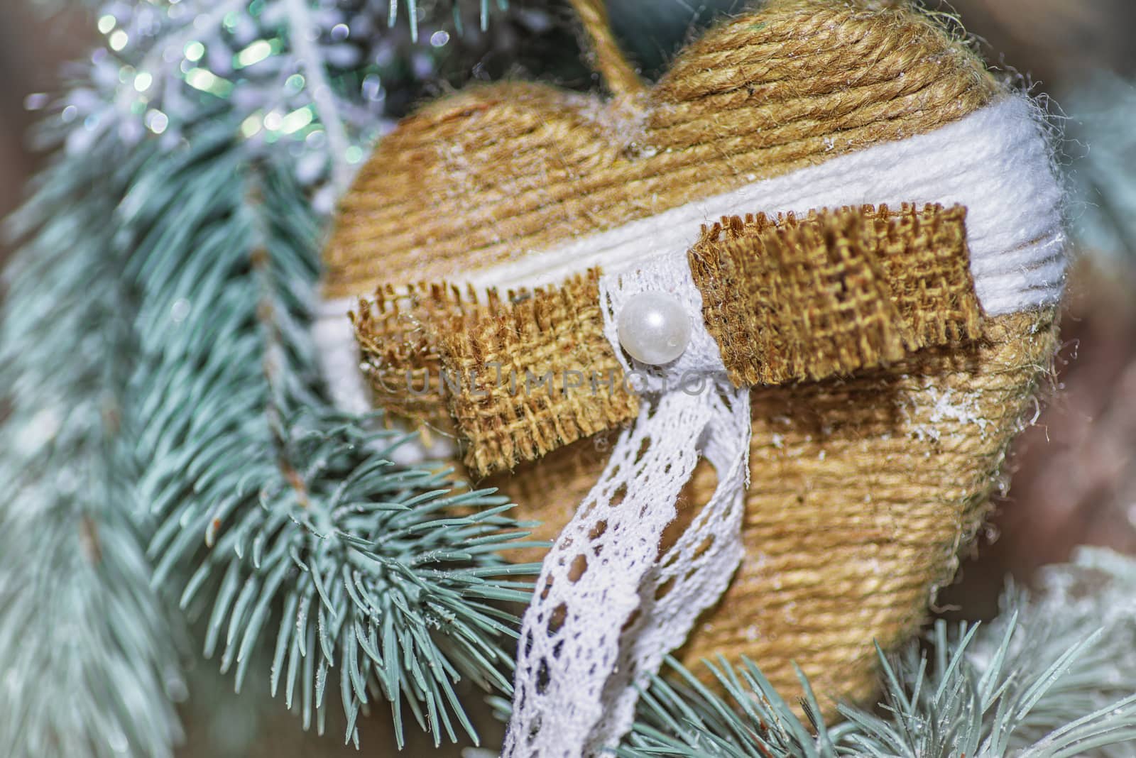 Xmas concept. soft selective focus.The decor on the Christmas tree on which the New Year's toys are hanging .Valentine's Day, February 14th.
