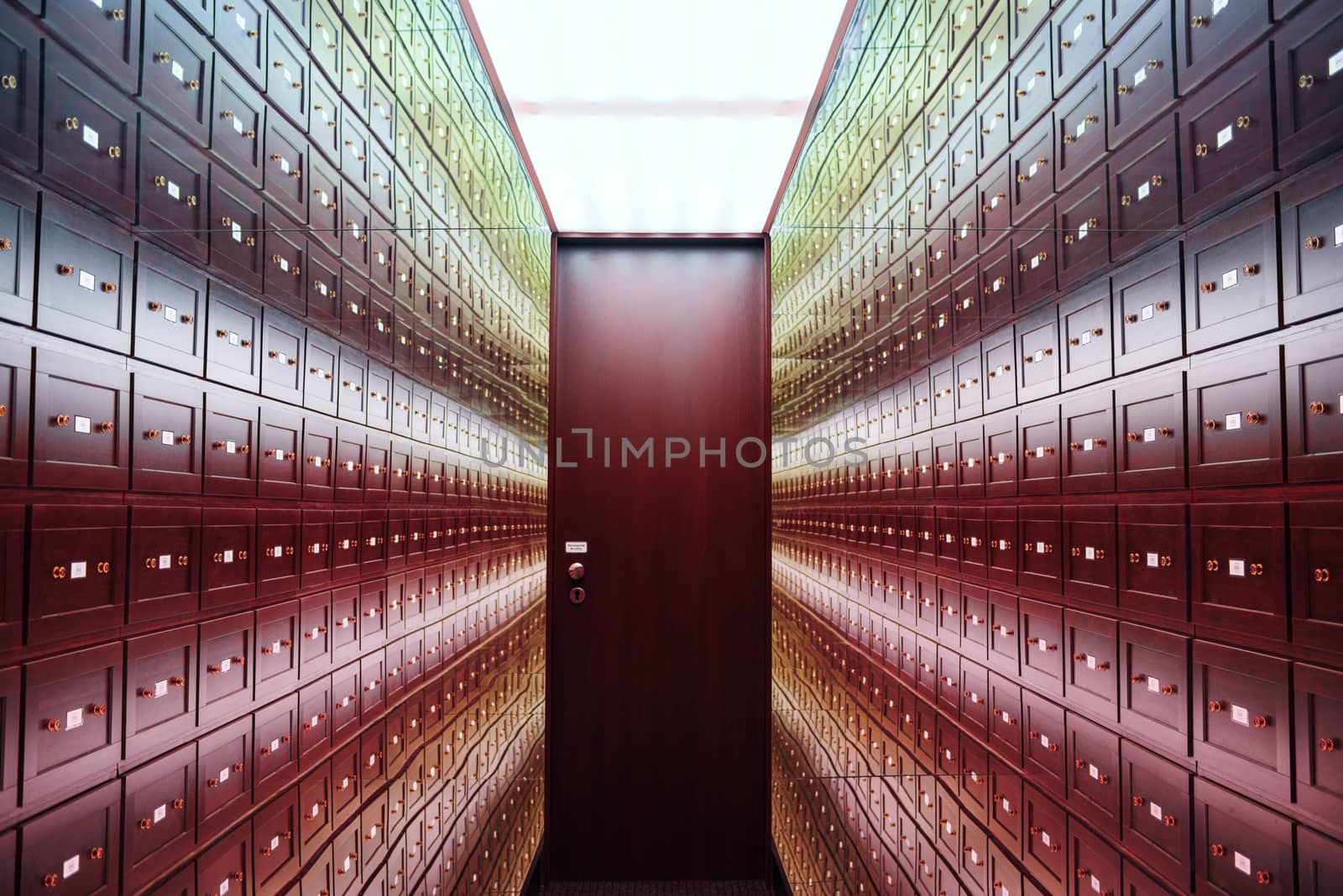 The safe room is a multi-colored room of illusions. A room of illusions.The room is safe with a brown door. The room is illuminated by a multi-colored light.