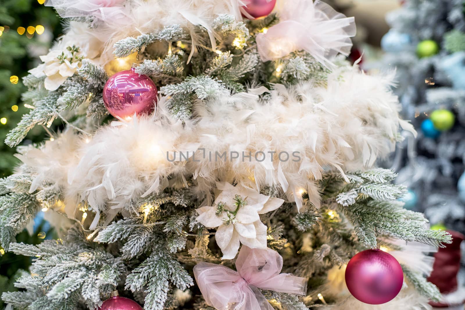 The decor on the Christmas tree on which the New Year's toys are hanging . Xmas concept. soft selective focus