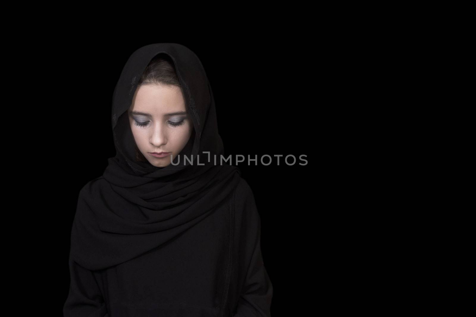 Arab girl close-up. Eyes of the Arab girl.Young arabian woman in hijab. close-up beautiful mysterious eyes eastern woman wearing a hijab