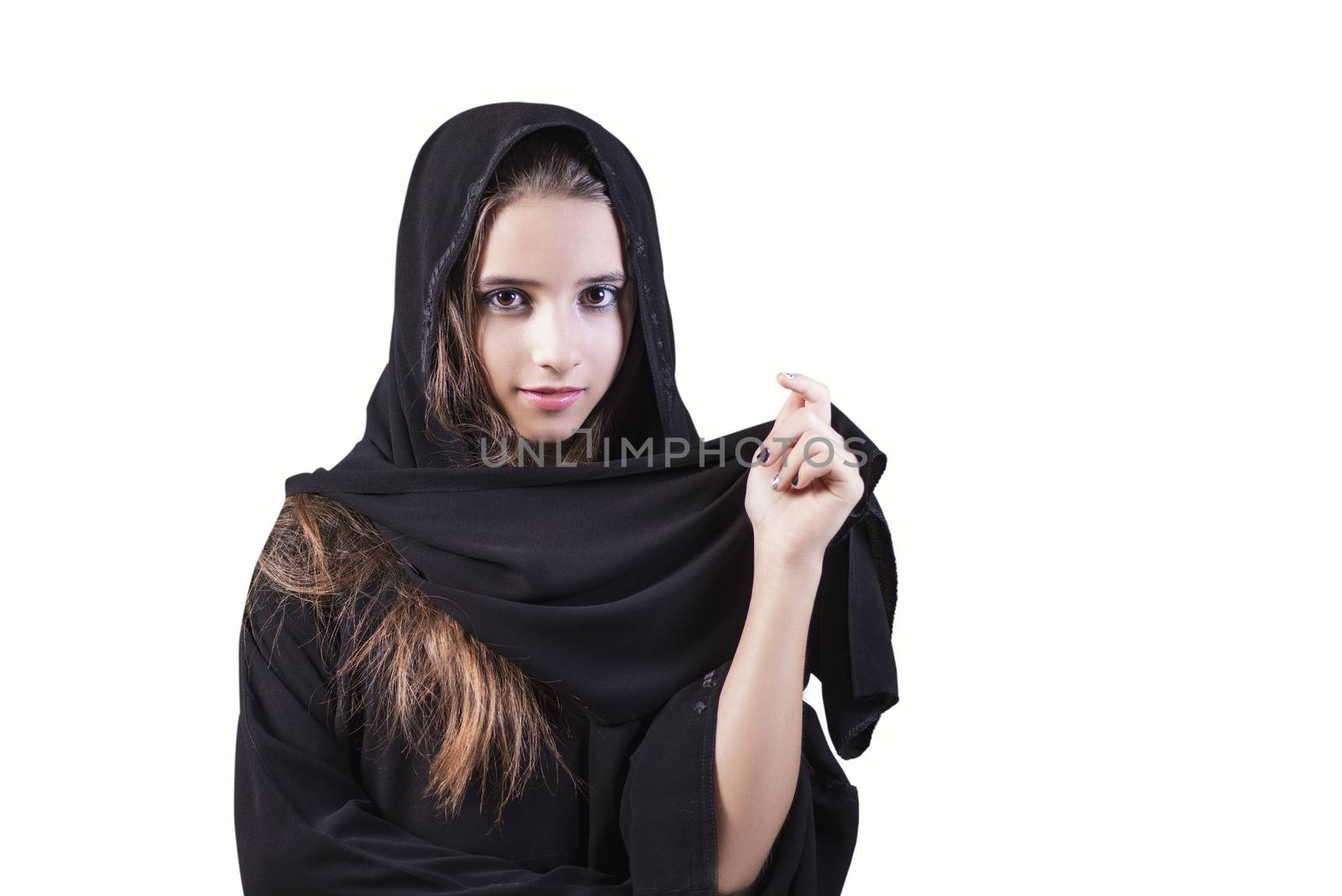 Arab saudi emirates woman face looking at side isolated on a white background. Arab girl closeup on a white background.Muslim.