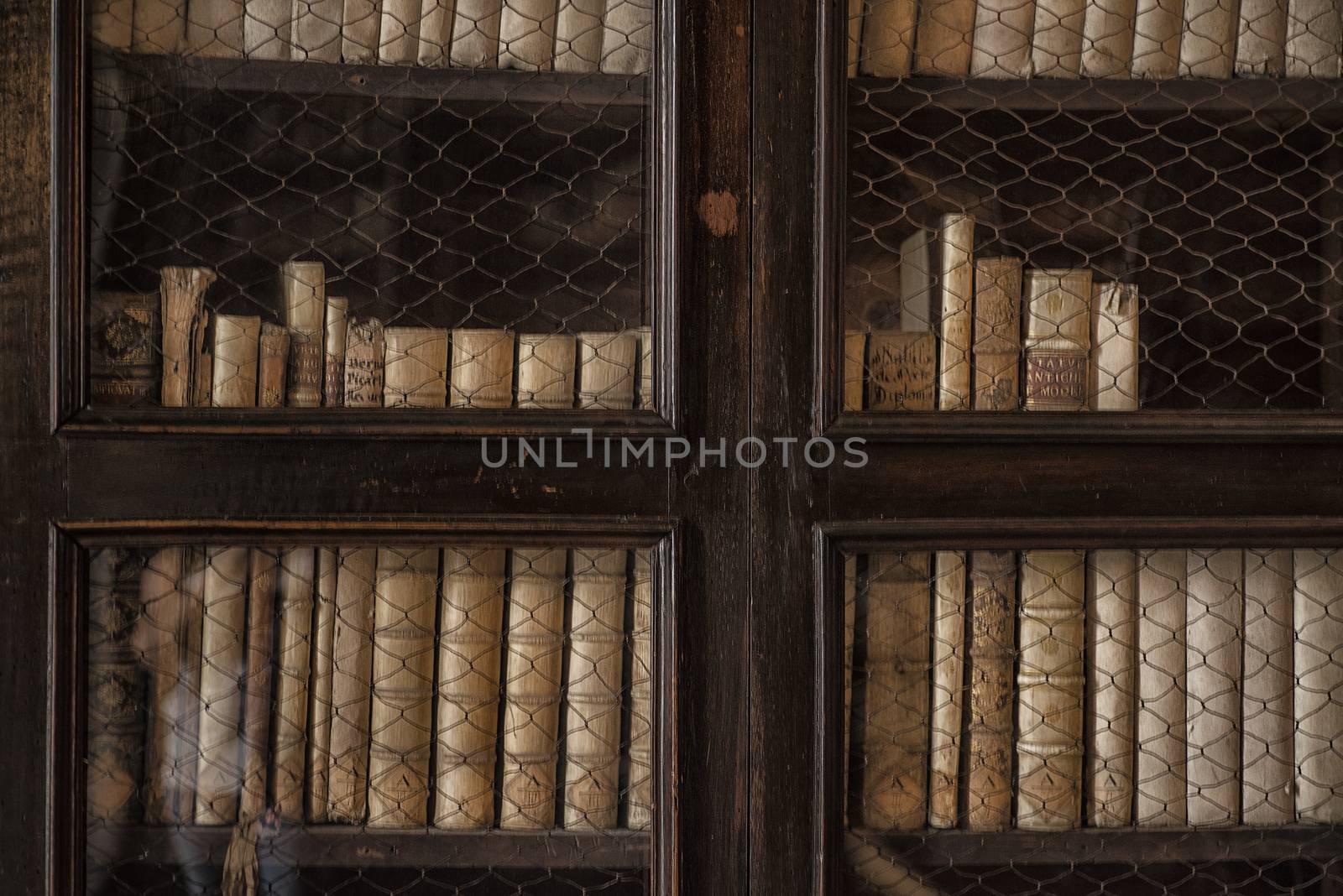 Old books. Background from old books. Bookshelf background.Old books are on the shelf in the closet.