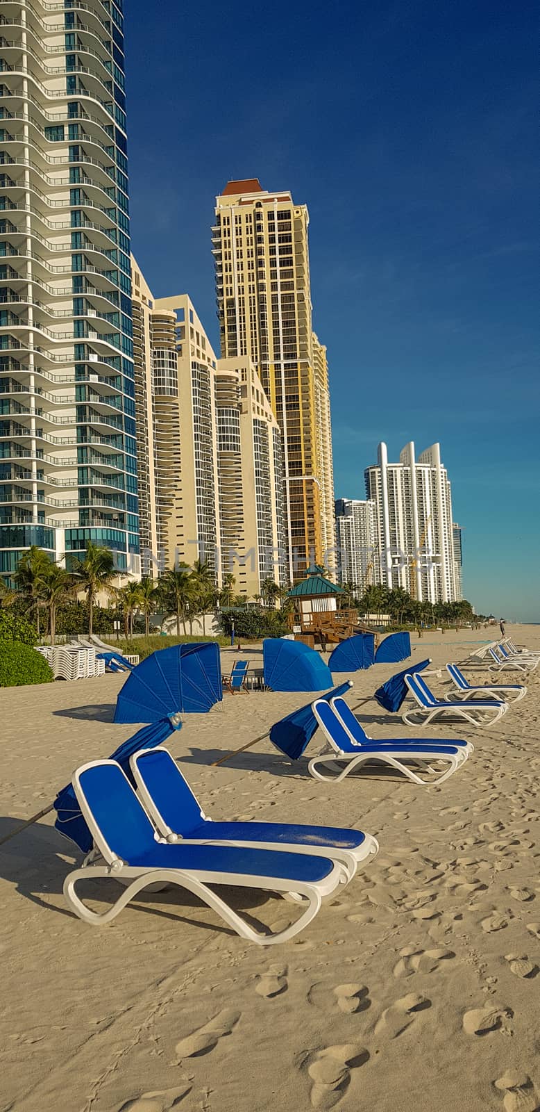 Beach Chairs In Sunny Isle Beach Florida by TheDutchcowboy