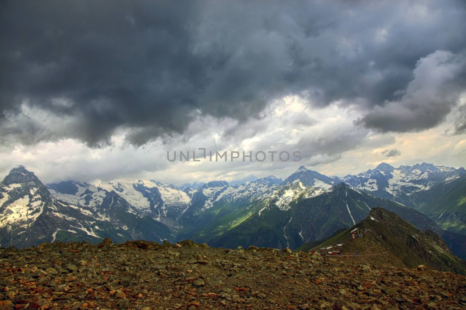 Panorama of mountains scene with dramatic blue sky in national park of Dombay