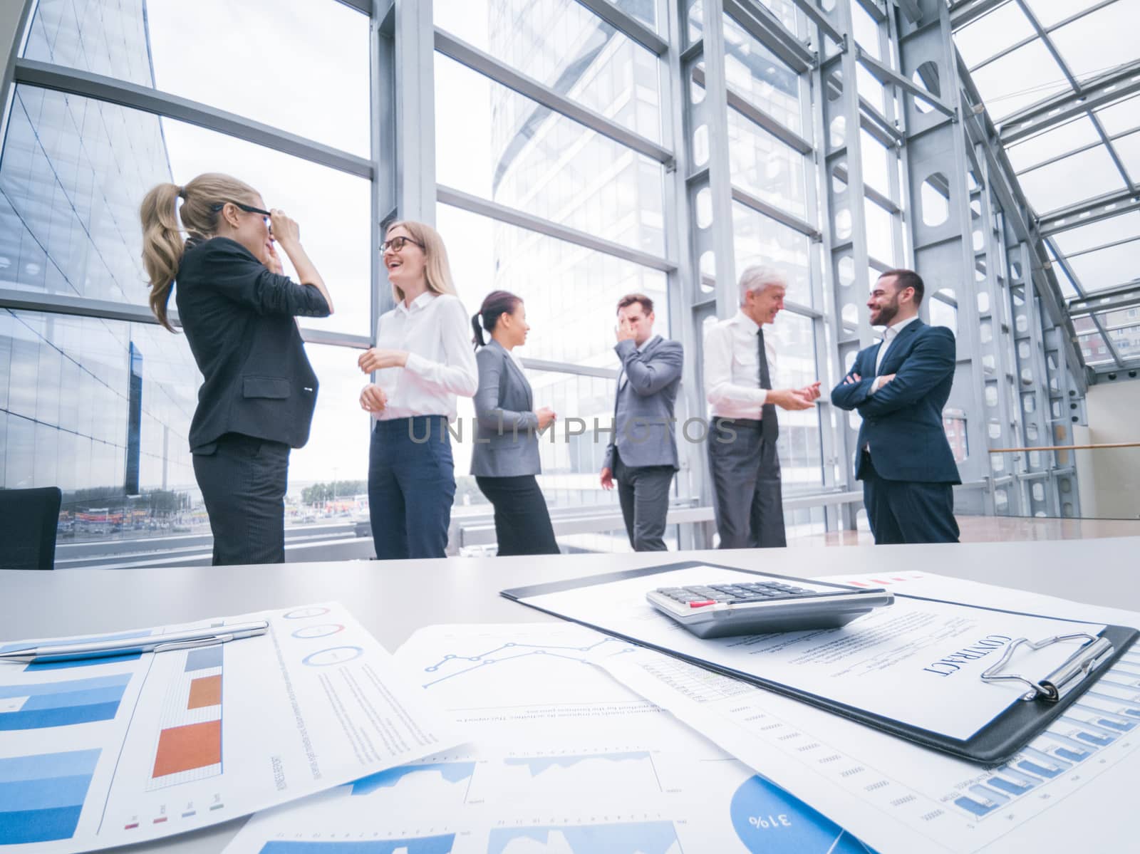 Co working conference, Executive team discussing the charts and graphs working in business strategy and financial plan to investment profit