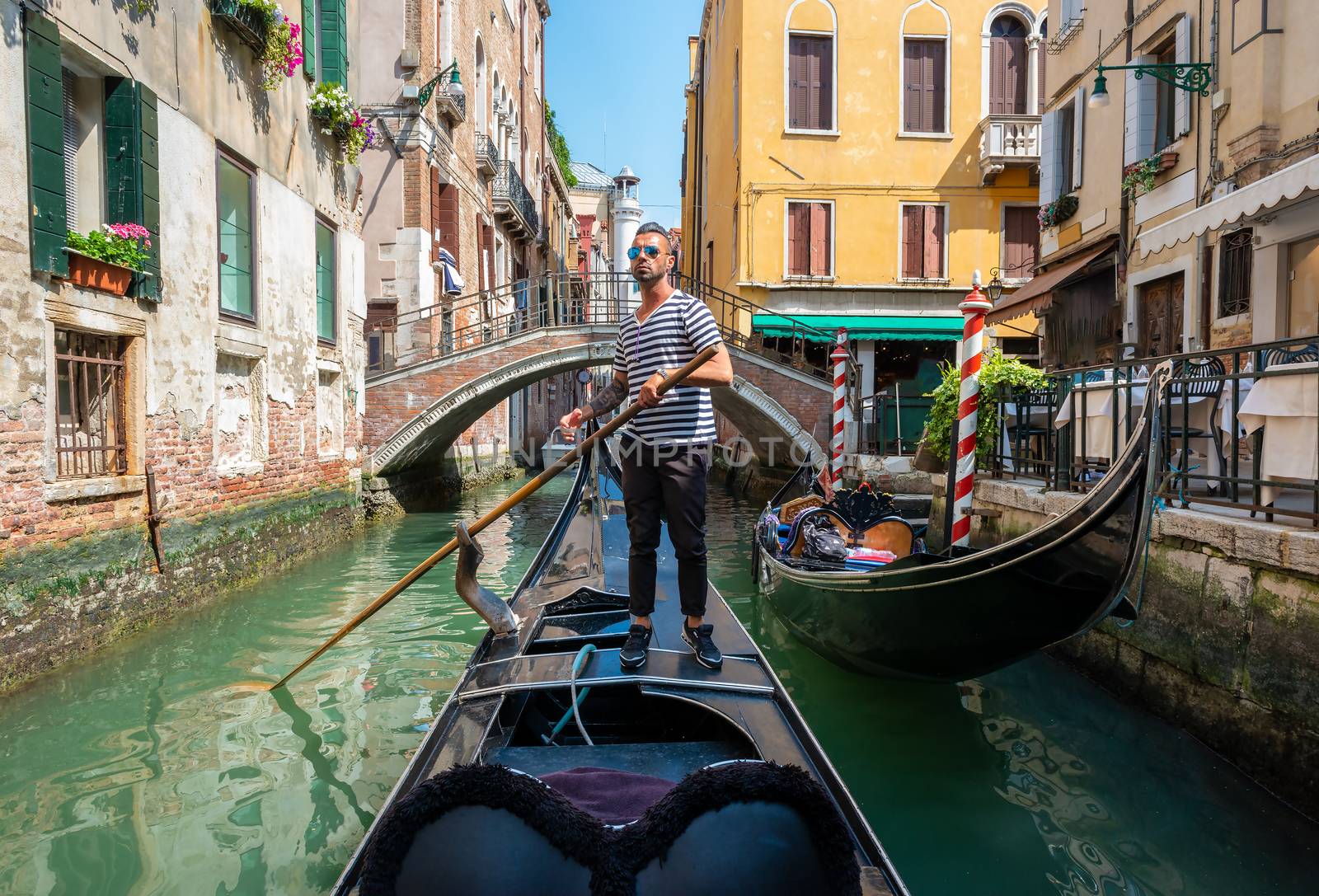 Gondolier in Venice by Givaga