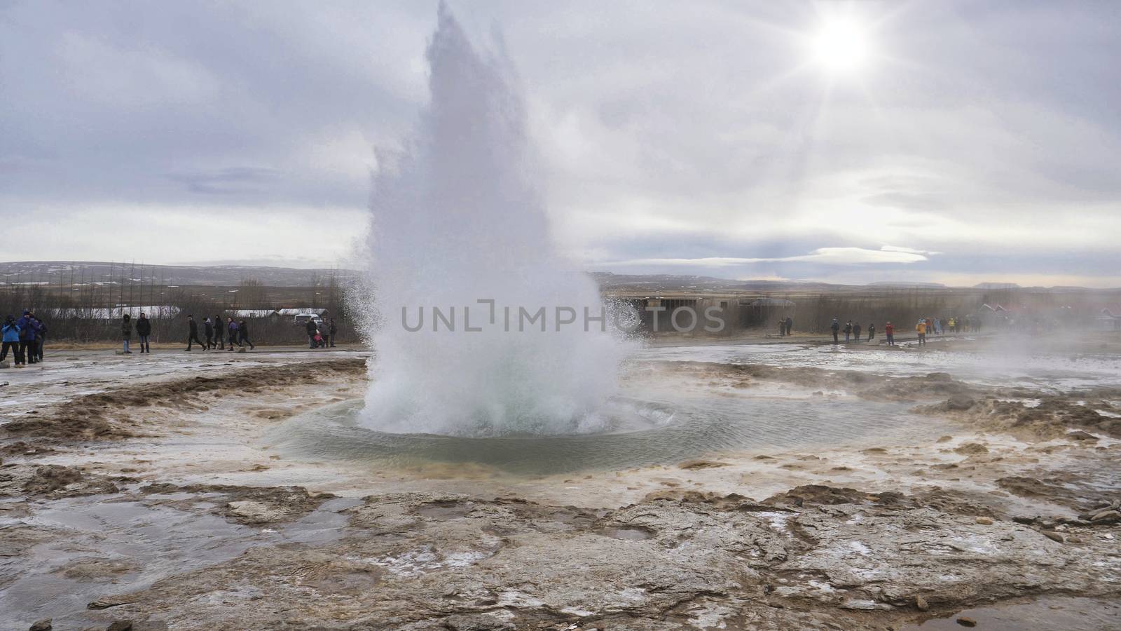 Geyser erupting in Iceland, producing big splash of hot water by artofphoto