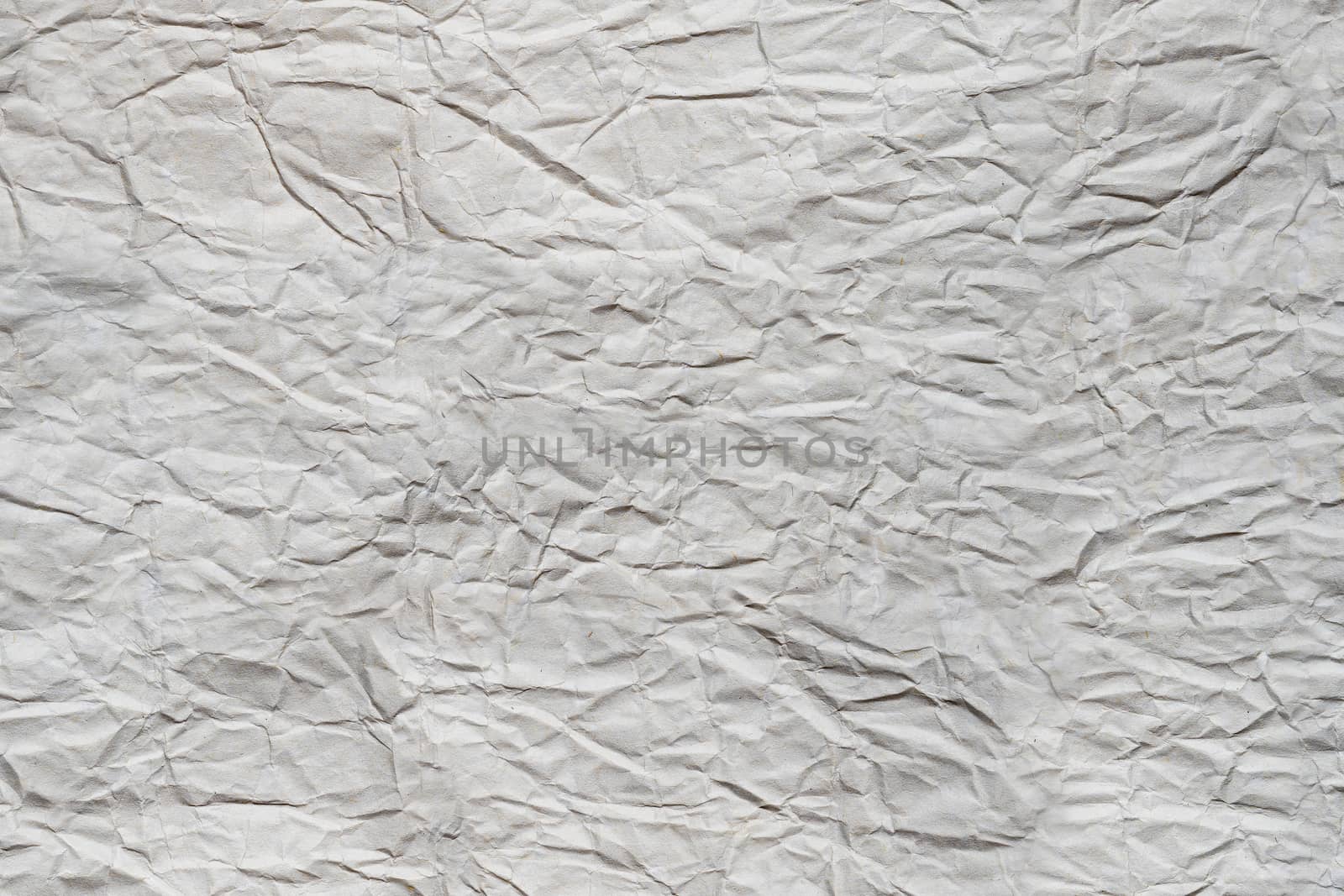 Close up texture of crumpled old paper. Vintage background. by SaitanSainam