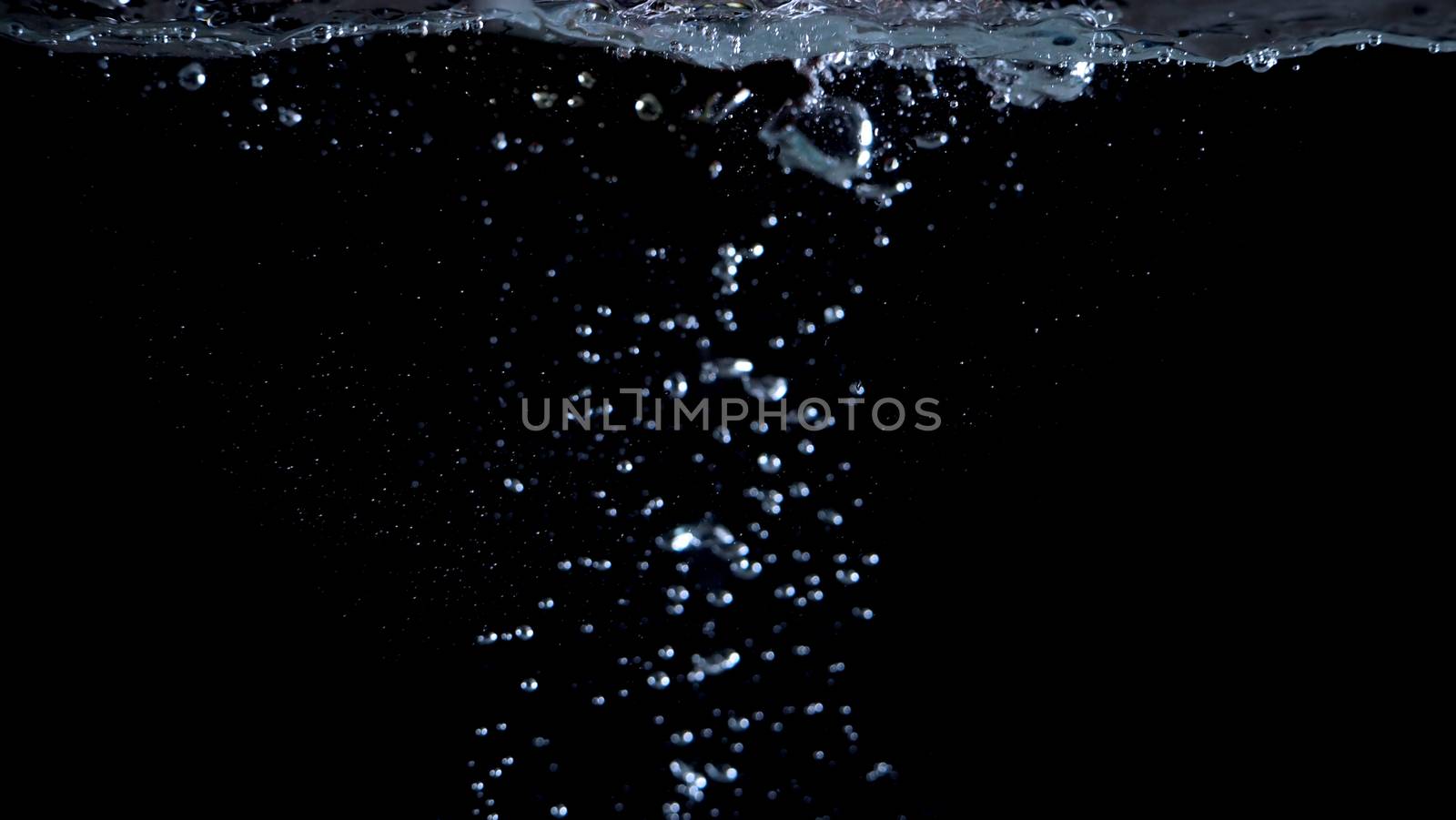 Blurry images of drinking water liquid bubbles or carbonate drink or oil shape or soda splashing and floating drop in black background for represent sparkling refreshment and refreshing