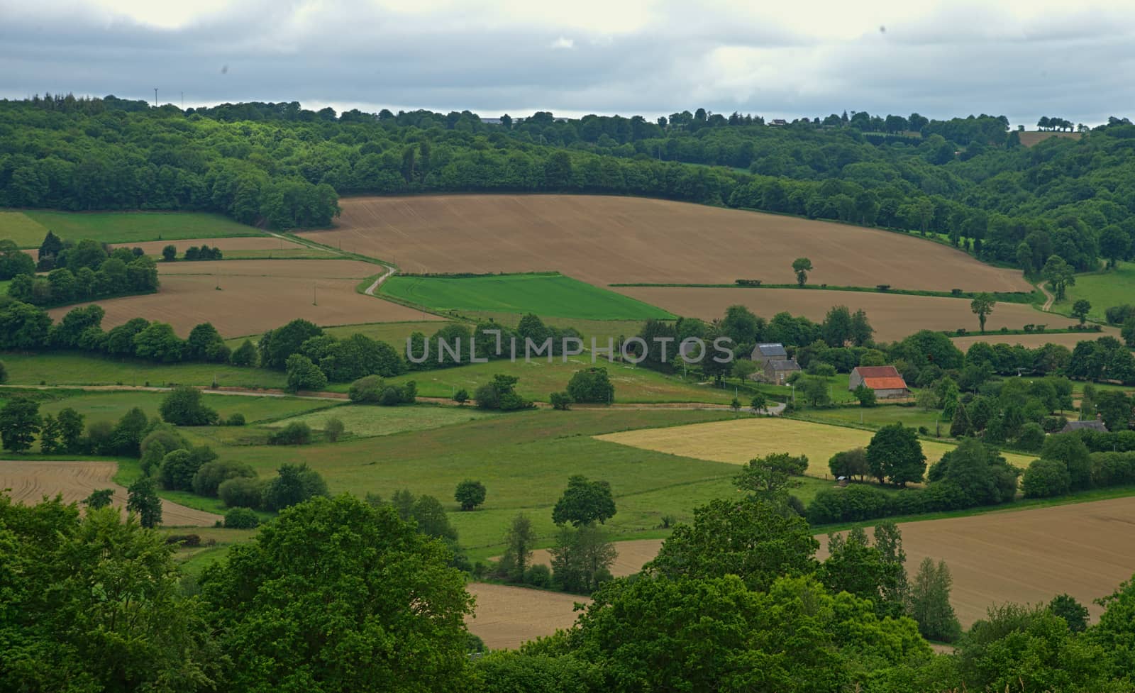 View from the hill on tranquil landscape in rural Normandy by sheriffkule