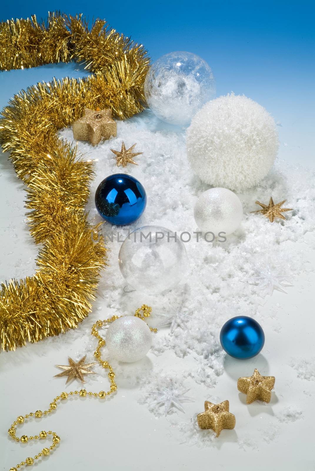 Christmas still life with toys and balls on a studio background
