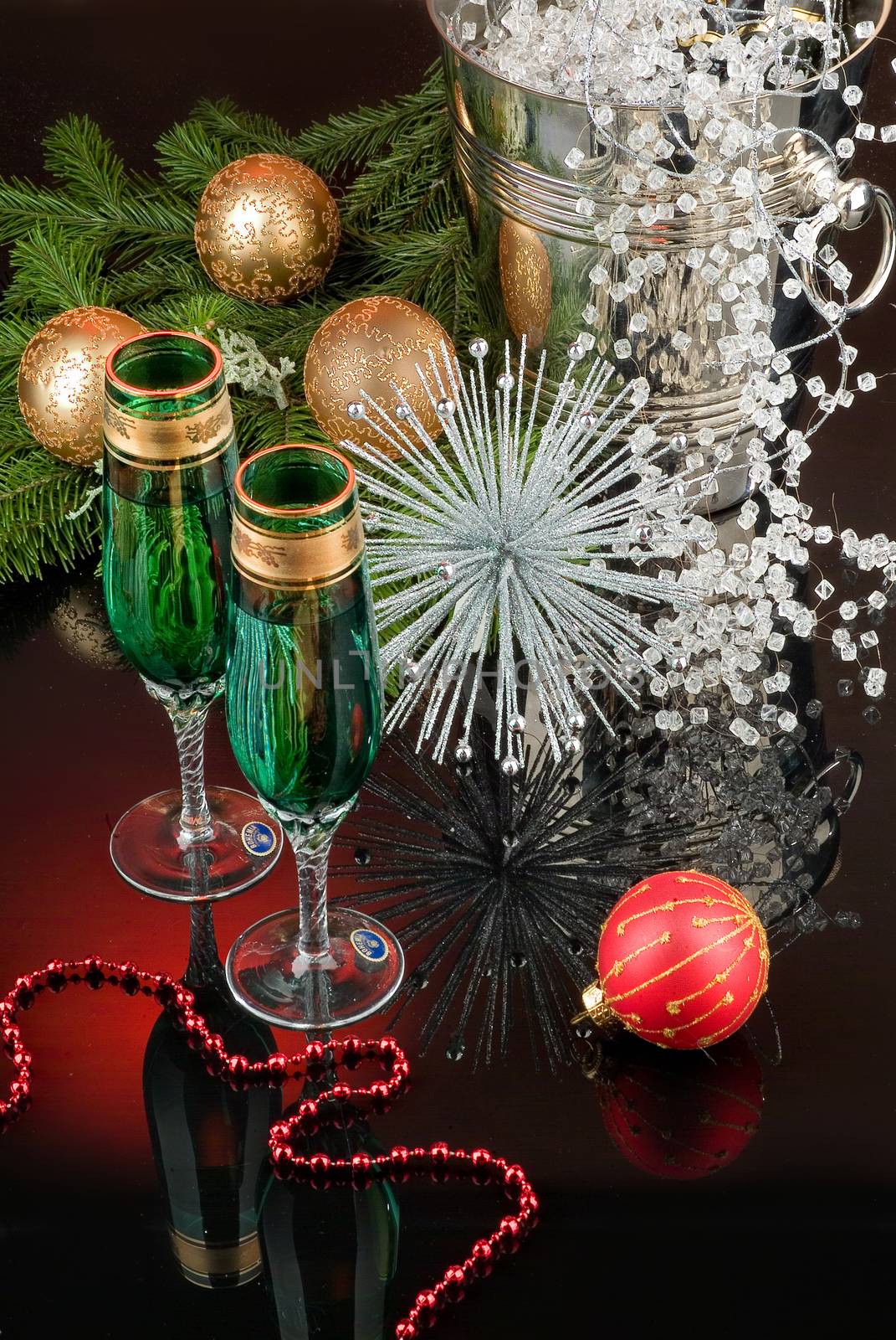 Glasses with wine on a decorative fabric background