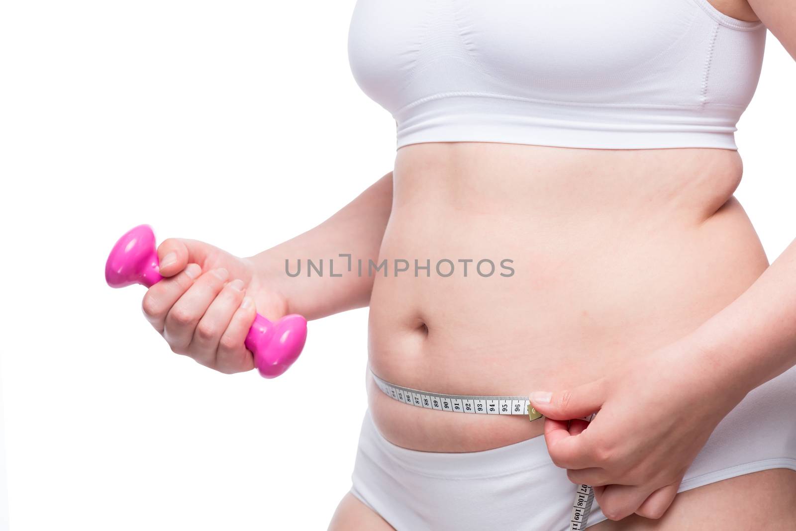 fat woman with dumbbells and centimeter ready for weight loss concept obesity