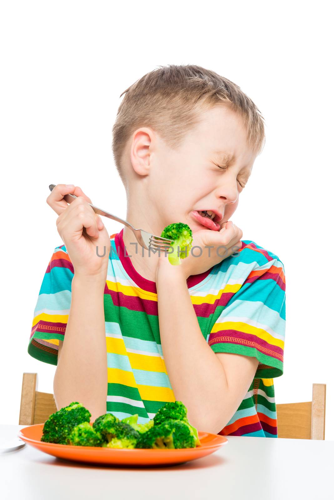 Emotional portrait of a child who does not like broccoli, the po by kosmsos111