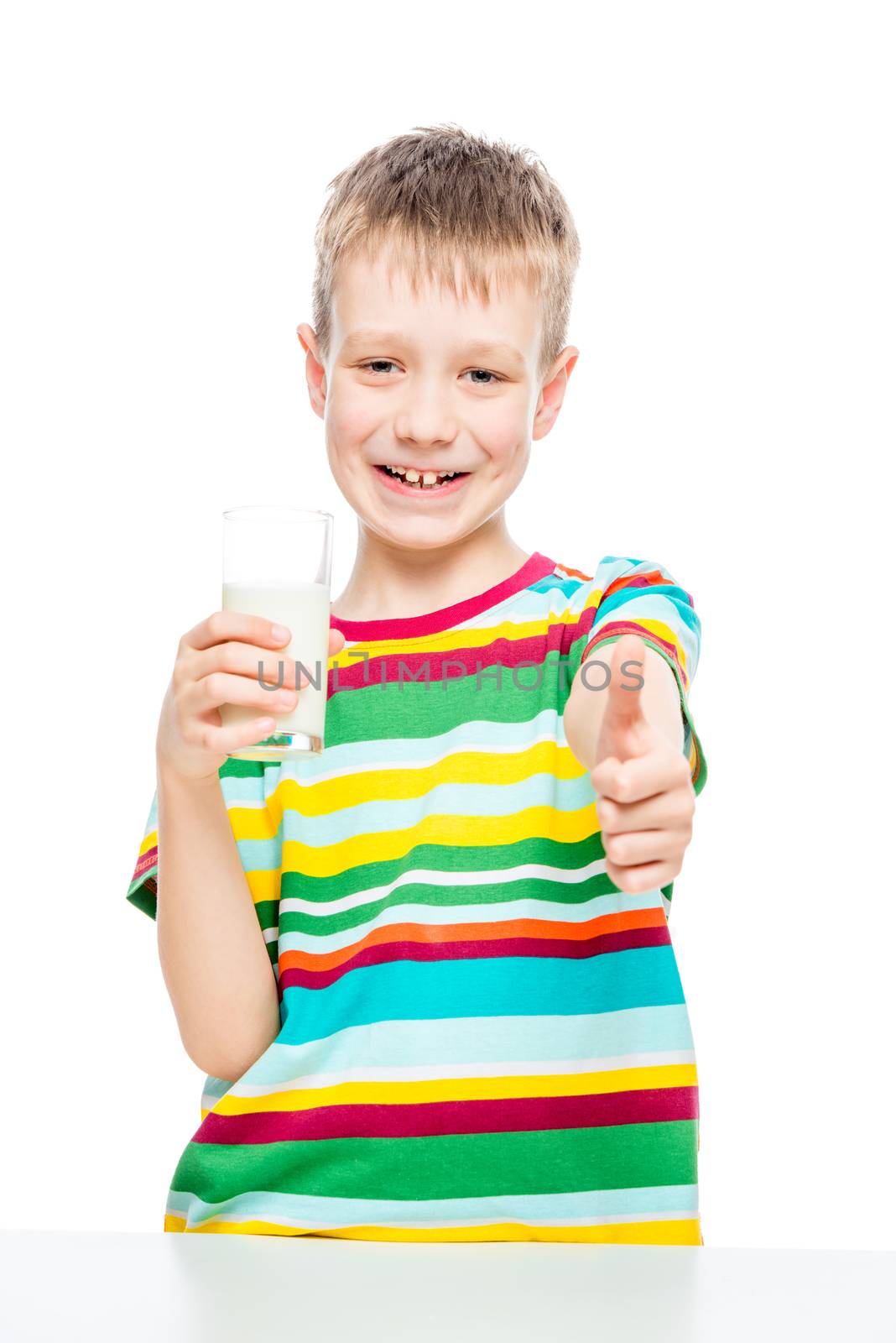 happy healthy baby with a glass of milk on a white background