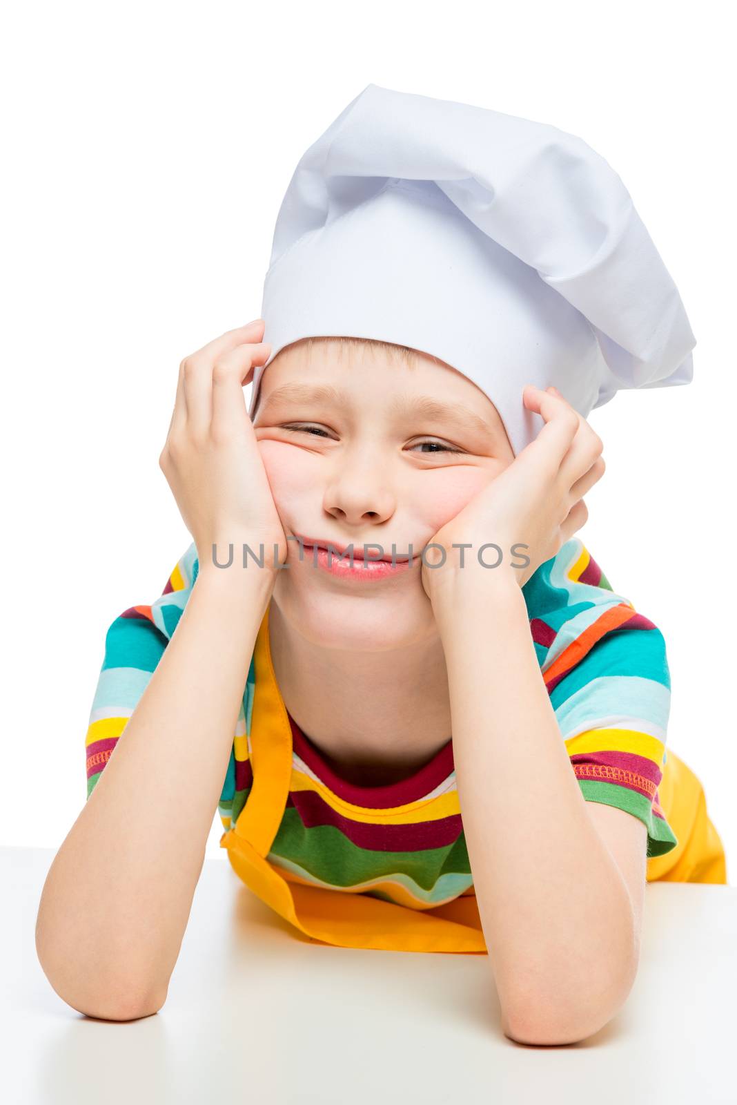 sad cook 10 years old in hat posing on white background by kosmsos111