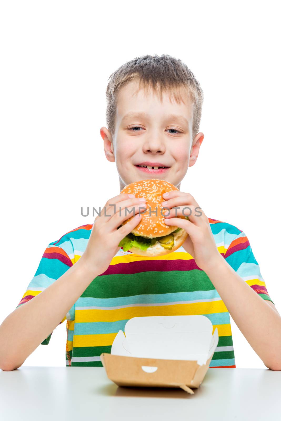 concept photo junk food - a boy with a hamburger on a white back by kosmsos111