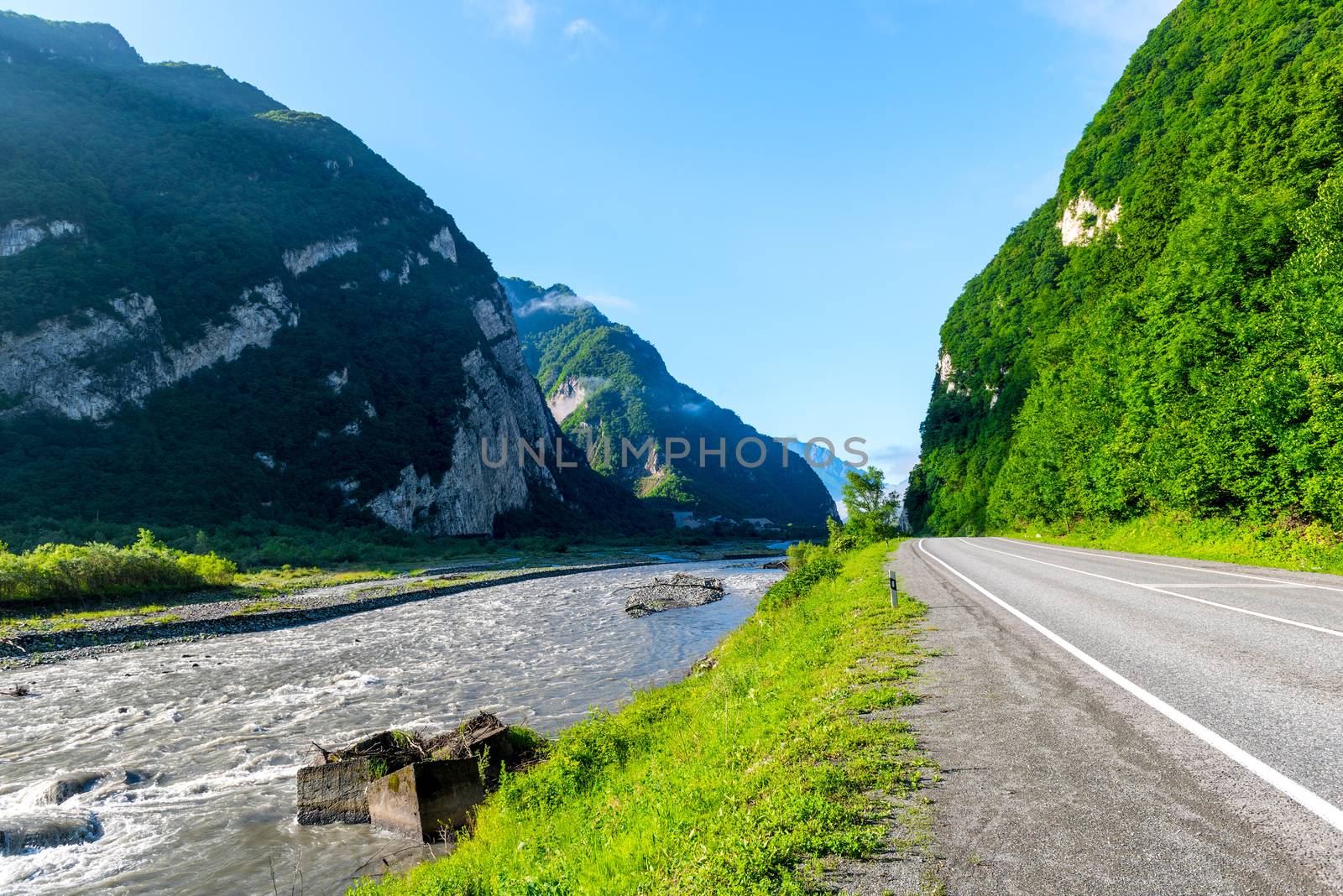 Mountain road along the river in the mountains of the Caucasus, by kosmsos111