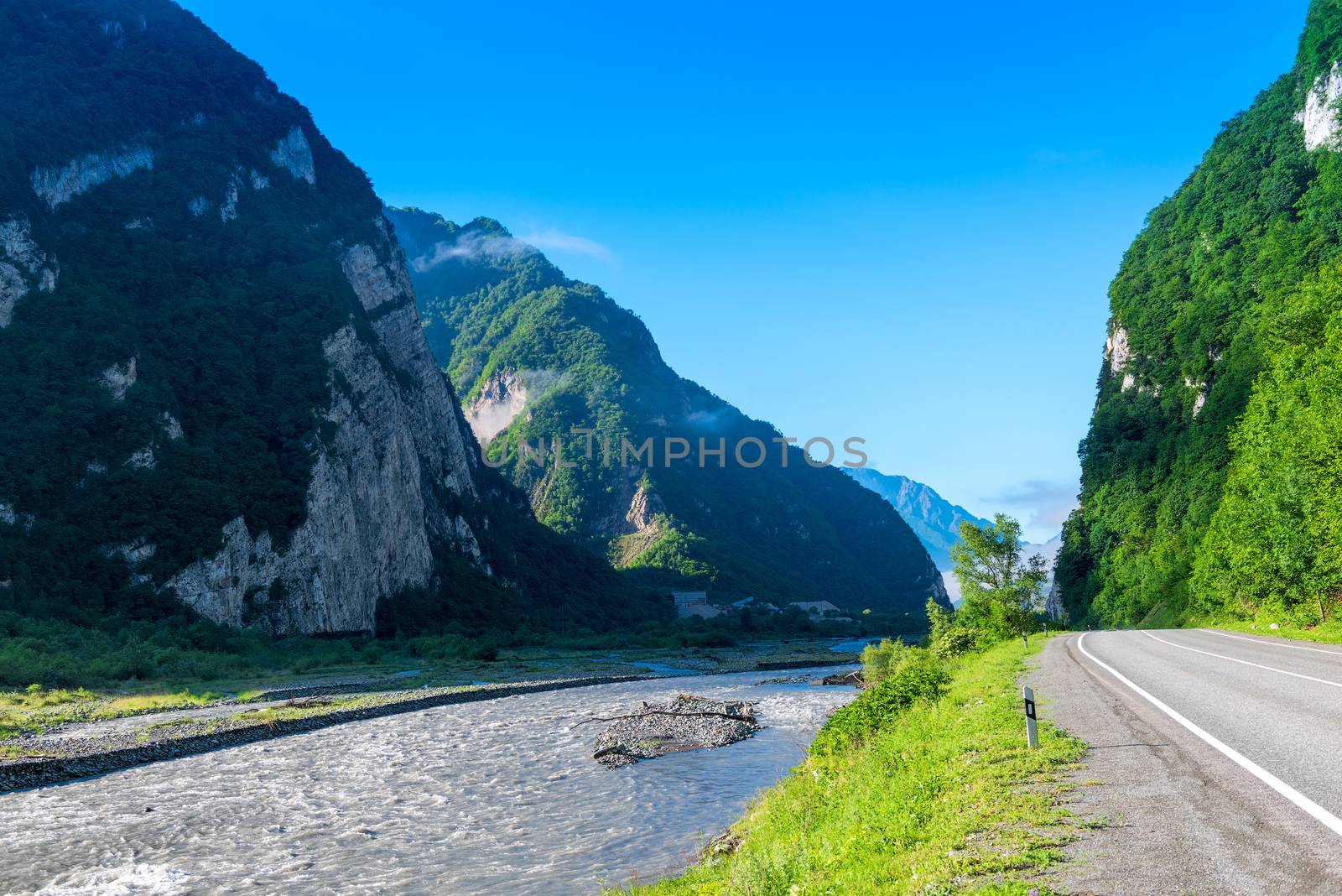 Beautiful mountain gorge of the Caucasus, river and road, Georgia