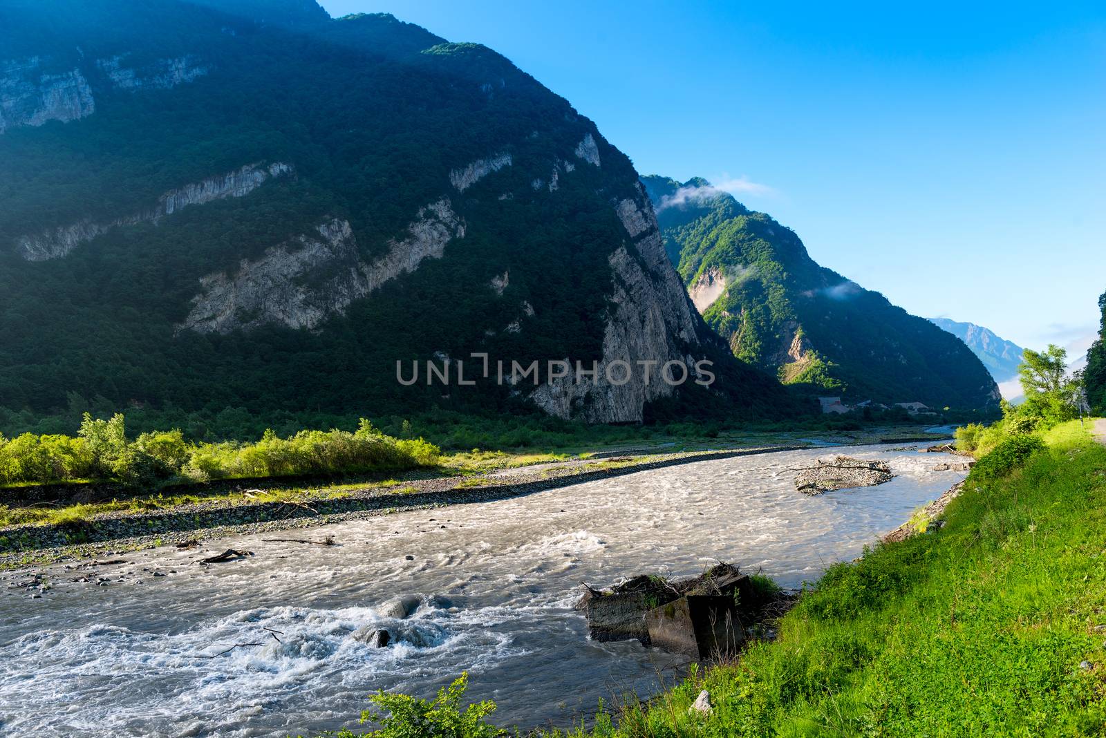 High green mountains of the Caucasus, view of the fast river, Ge by kosmsos111