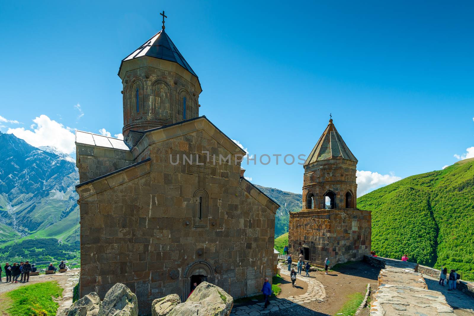 Beautiful Trinity Church above the village of Gergeti in Georgia on the mountain